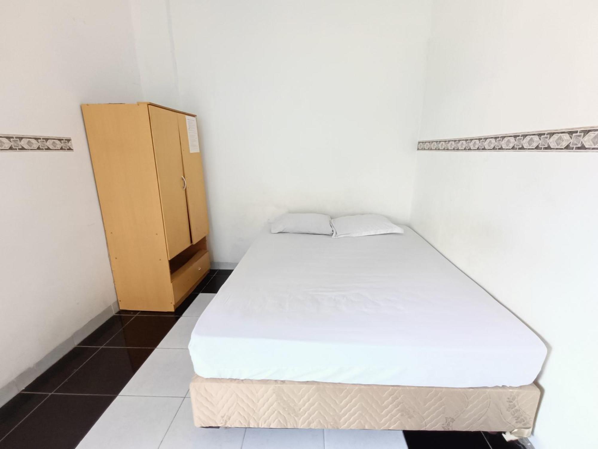 Bumi Merpati Residence Makassar Mitra Reddoorz Buitenkant foto